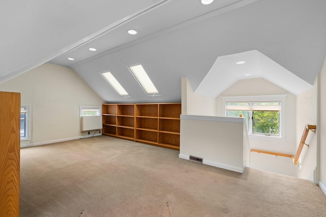 1054 Ferdon Rd, Ann Arbor, MI 48104 - bonus room with vaulted ceiling, recessed lighting, carpet, and baseboards