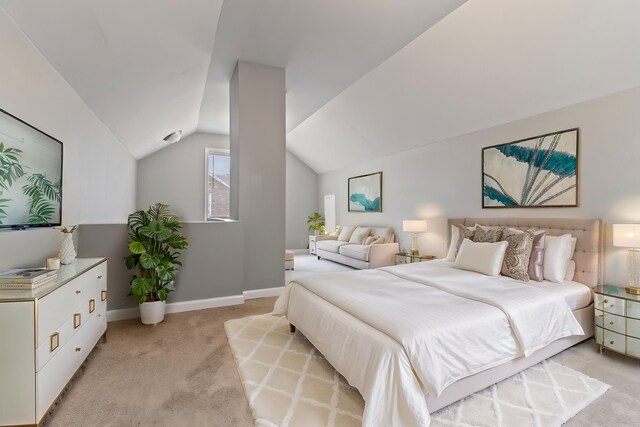 20172 Stotter St, Detroit, MI 48234 - bedroom featuring light colored carpet, vaulted ceiling, and baseboards