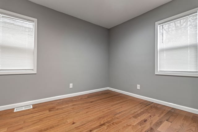 20172 Stotter St, Detroit, MI 48234 - unfurnished room with baseboards and light wood finished floors