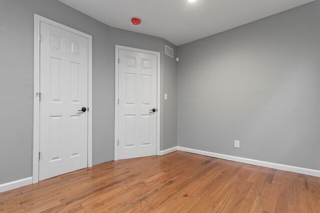 20172 Stotter St, Detroit, MI 48234 - unfurnished bedroom with light wood-style flooring and baseboards