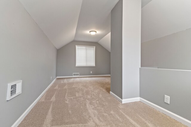 20172 Stotter St, Detroit, MI 48234 - bonus room with vaulted ceiling, carpet floors, and baseboards