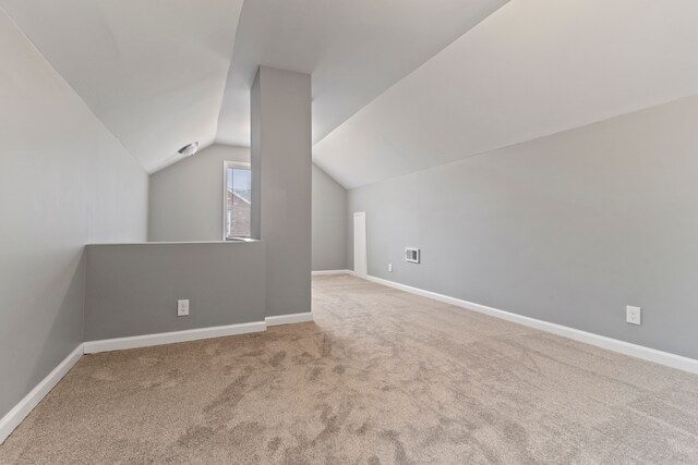 20172 Stotter St, Detroit, MI 48234 - bonus room with carpet flooring, vaulted ceiling, and baseboards