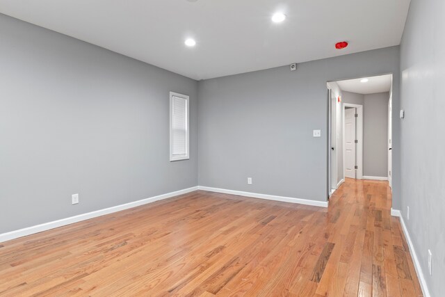 20172 Stotter St, Detroit, MI 48234 - unfurnished room featuring baseboards, light wood-style flooring, and recessed lighting