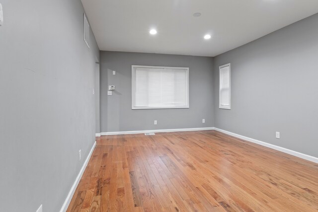 20172 Stotter St, Detroit, MI 48234 - empty room featuring light wood-style flooring, baseboards, and recessed lighting