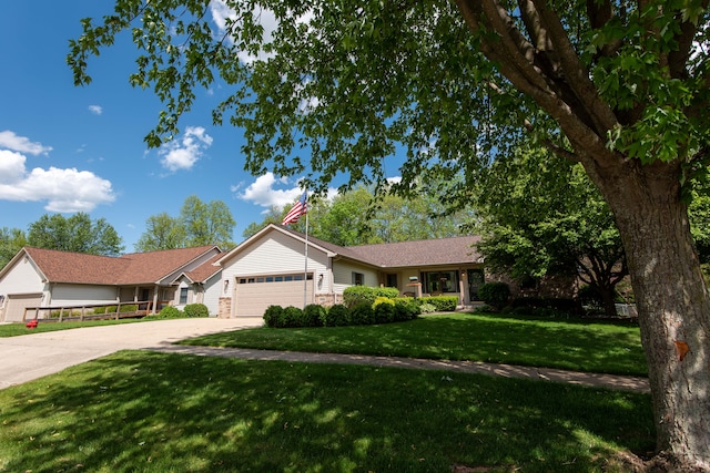 906 Village Dr, Davison, MI 48423 - single story home featuring a front yard, an attached garage, and concrete driveway