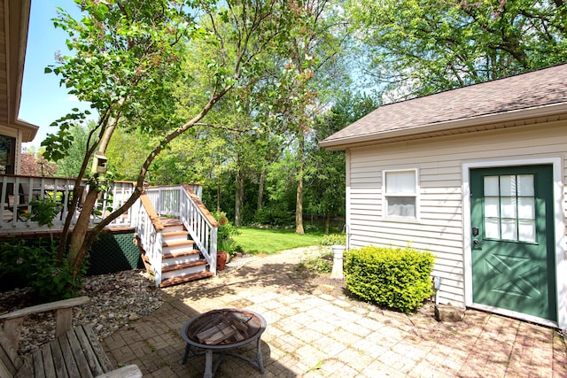 906 Village Dr, Davison, MI 48423 - view of patio / terrace with a deck, a fire pit, and stairs
