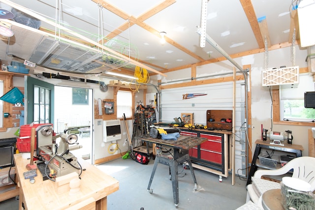 906 Village Dr, Davison, MI 48423 - garage with a workshop area and heating unit