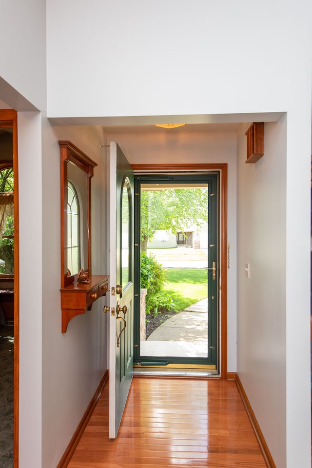 906 Village Dr, Davison, MI 48423 - foyer entrance featuring light wood-style floors and baseboards
