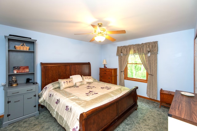 906 Village Dr, Davison, MI 48423 - bedroom featuring dark carpet, ceiling fan, and baseboards