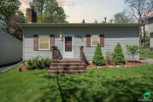 243 Reno St, Lake Orion, MI 48362 - view of front of house with a chimney