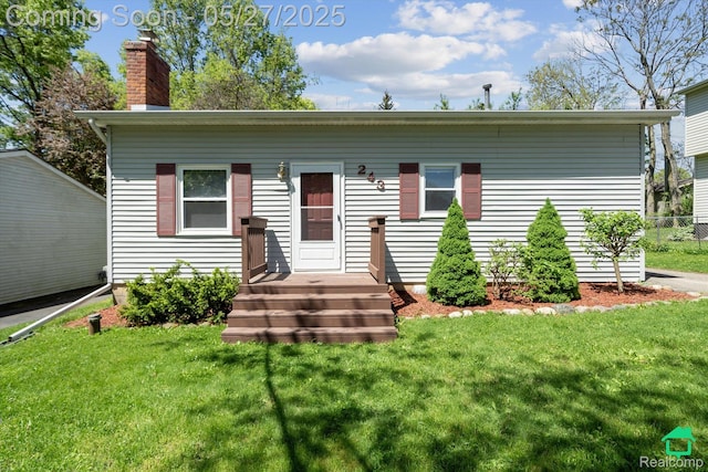 243 Reno St, Lake Orion, MI 48362 - view of front of property featuring a chimney