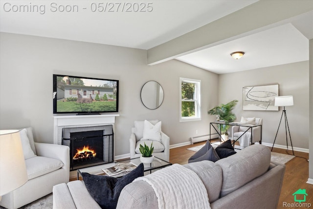 243 Reno St, Lake Orion, MI 48362 - living area featuring a lit fireplace, wood finished floors, beam ceiling, and baseboards