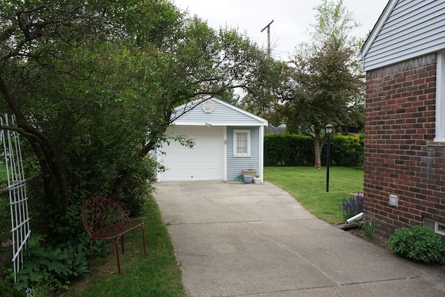 20727 Carlysle St, Dearborn, MI 48124 - view of patio / terrace with driveway, an outdoor structure, and a garage
