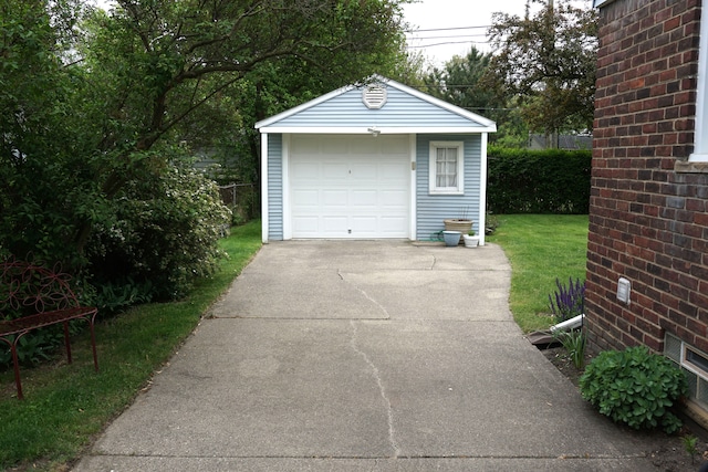 20727 Carlysle St, Dearborn, MI 48124 - detached garage featuring concrete driveway