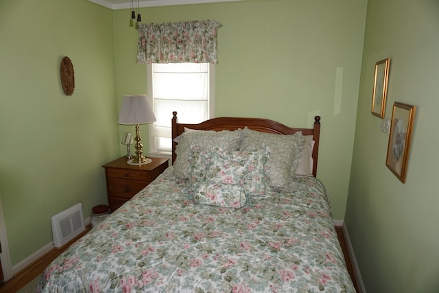 20727 Carlysle St, Dearborn, MI 48124 - bedroom featuring baseboards and wood finished floors
