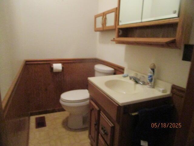 260 W Saint Joseph St, Coloma, MI 49038 - half bathroom with toilet and vanity