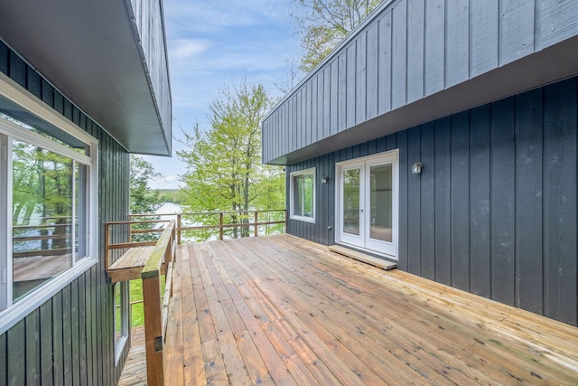 11290 Alpine Rd, Canadian Lakes, MI 49346 - wooden deck featuring french doors
