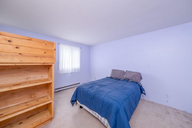 11290 Alpine Rd, Canadian Lakes, MI 49346 - bedroom with a baseboard radiator and carpet flooring