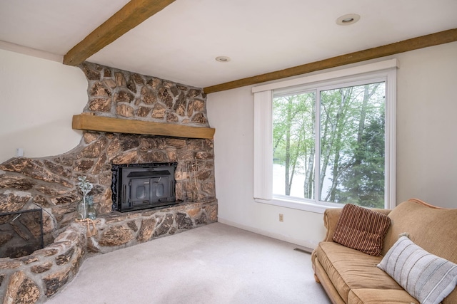 11290 Alpine Rd, Canadian Lakes, MI 49346 - living room with healthy amount of natural light, carpet, and beam ceiling