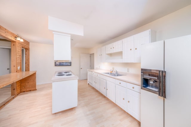 11290 Alpine Rd, Canadian Lakes, MI 49346 - kitchen with white appliances, a sink, white cabinets, and light wood-style flooring
