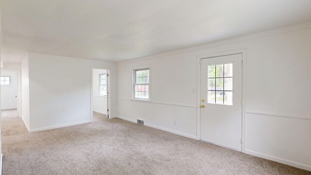 6 Congress Ct Unit D, Saginaw, MI 48602 - spare room featuring carpet flooring and baseboards