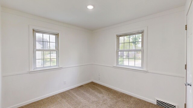 6 Congress Ct Unit D, Saginaw, MI 48602 - spare room with baseboards, light colored carpet, and recessed lighting