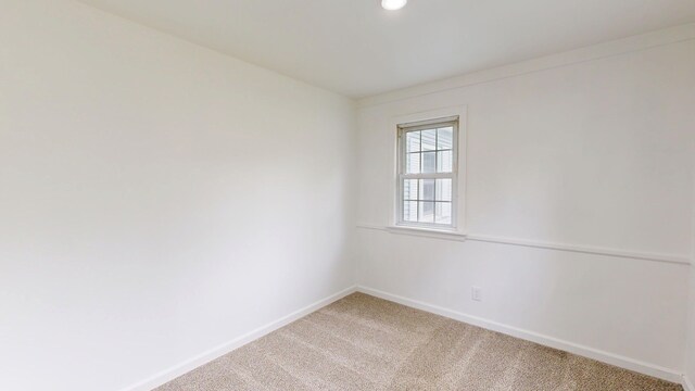 6 Congress Ct Unit D, Saginaw, MI 48602 - unfurnished room featuring baseboards, light carpet, and recessed lighting