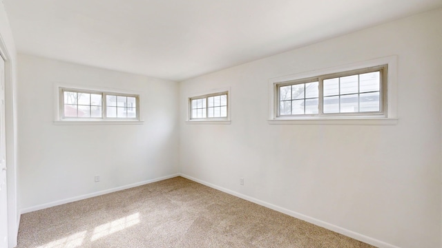 6 Congress Ct Unit D, Saginaw, MI 48602 - carpeted spare room with baseboards