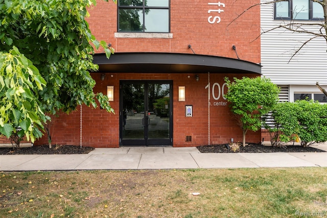 100 N Center St Unit 404, Royal Oak, MI 48067 - view of exterior entry with french doors and brick siding