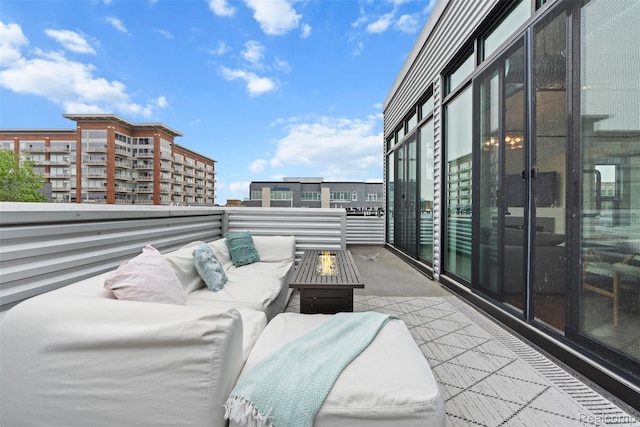 100 N Center St Unit 404, Royal Oak, MI 48067 - balcony with an outdoor living space with a fire pit