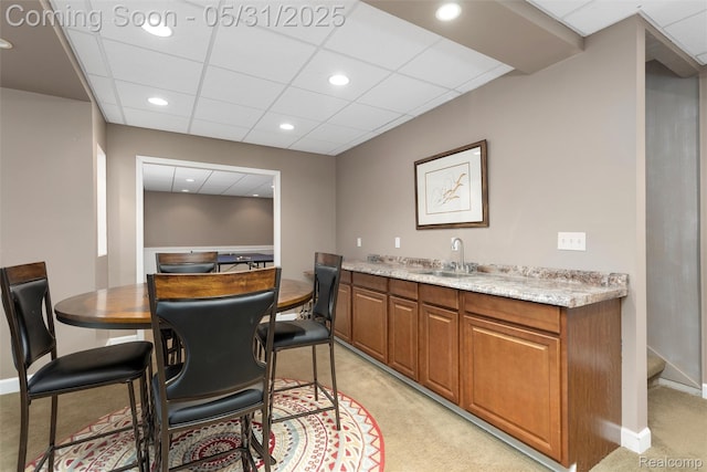 4470 Coastal Pkwy, White Lake, MI 48386 - indoor wet bar with light colored carpet, baseboards, recessed lighting, and a drop ceiling