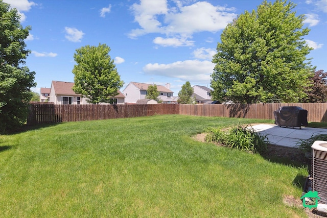 7458 Knollwood Dr, Ypsilanti, MI 48197 - view of yard with a patio area, central AC unit, and a residential view