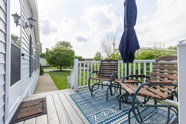 305 Oak Ridge St, Mason, MI 48854 - view of wooden deck