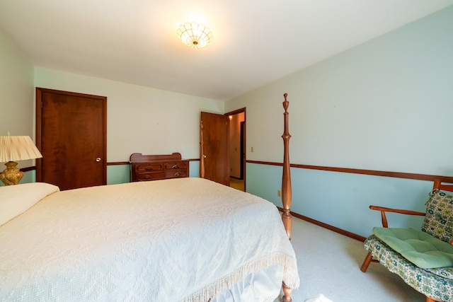 carpeted bedroom with baseboards