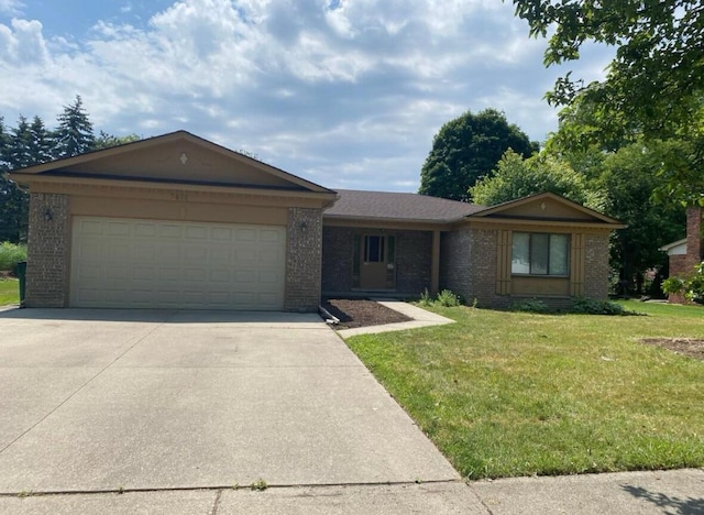 single story home with brick siding, a garage, concrete driveway, and a front yard