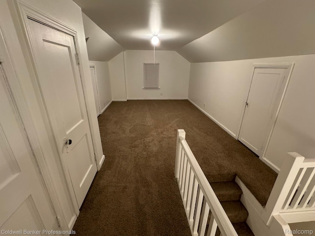 2474 Atkinson St, Detroit, MI 48206 - additional living space with dark carpet, vaulted ceiling, and baseboards