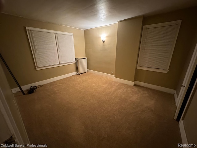 2474 Atkinson St, Detroit, MI 48206 - unfurnished bedroom featuring light carpet and baseboards
