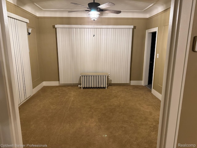 2474 Atkinson St, Detroit, MI 48206 - spare room with radiator, carpet flooring, ceiling fan, and baseboards