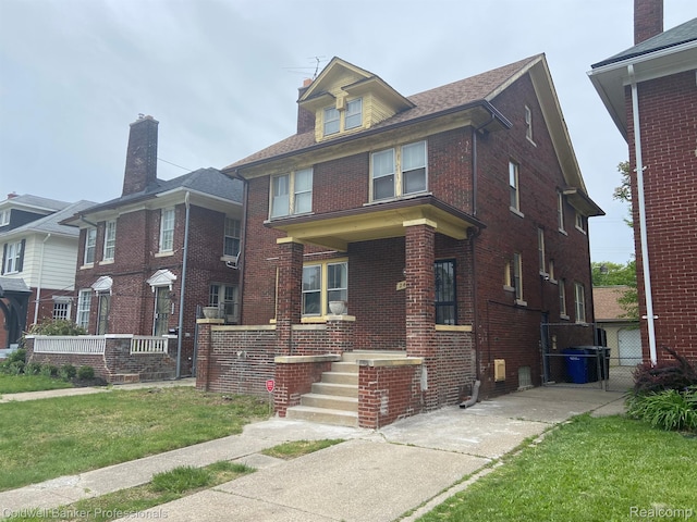 2474 Atkinson St, Detroit, MI 48206 - american foursquare style home with brick siding