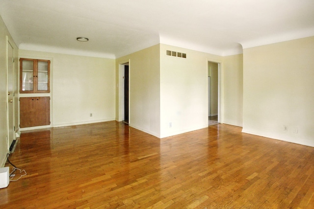 1469 Westwood Dr, Flint, MI 48532 - spare room with wood finished floors and baseboards