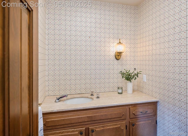 18851 Capitol Dr, Southfield, MI 48075 - bathroom with vanity and wallpapered walls