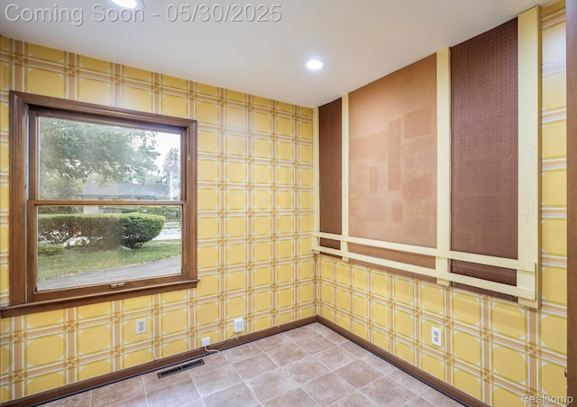 18851 Capitol Dr, Southfield, MI 48075 - spare room with recessed lighting and light tile patterned floors