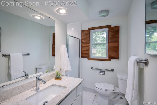 18851 Capitol Dr, Southfield, MI 48075 - bathroom with toilet, plenty of natural light, and vanity