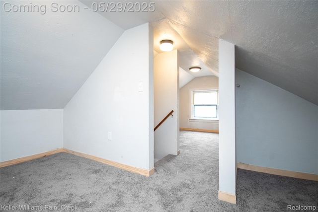 72 N Astor St, Pontiac, MI 48342 - additional living space with carpet flooring, vaulted ceiling, and baseboards
