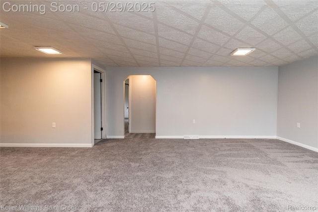 72 N Astor St, Pontiac, MI 48342 - carpeted empty room with arched walkways and baseboards