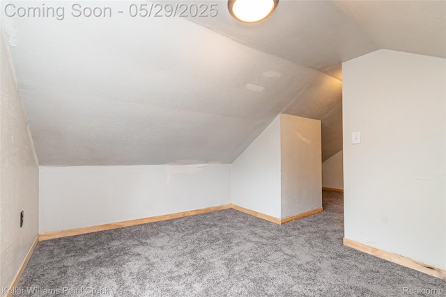 72 N Astor St, Pontiac, MI 48342 - bonus room with lofted ceiling, carpet floors, and baseboards