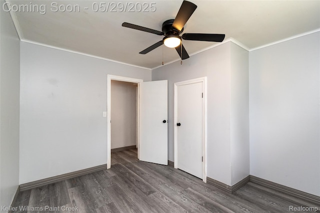 72 N Astor St, Pontiac, MI 48342 - spare room featuring wood finished floors, ornamental molding, ceiling fan, and baseboards