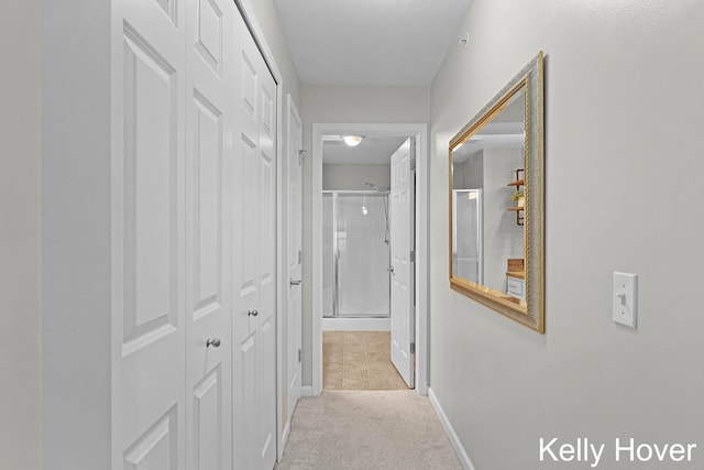 3514 River Run St, Wyoming, MI 49418 - hallway with light colored carpet, baseboards, and a textured ceiling