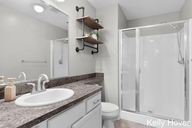3514 River Run St, Wyoming, MI 49418 - full bath with a shower stall, tile patterned floors, toilet, and vanity