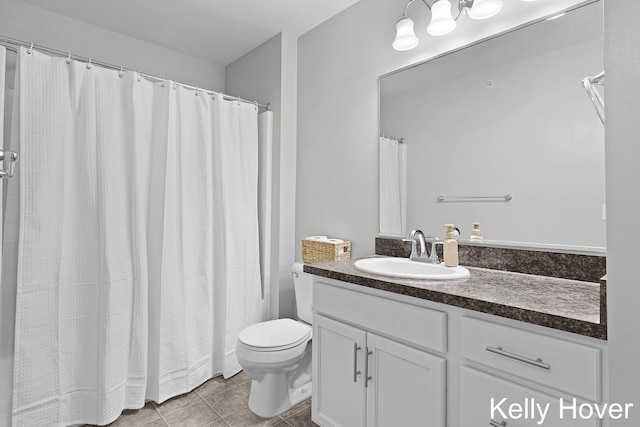 3514 River Run St, Wyoming, MI 49418 - bathroom featuring tile patterned floors, toilet, vanity, and a shower with curtain